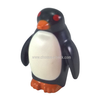 Schwarzer Pinguin mit Flossen und Niete auf dem Rücken, orangefarbenem Schnabel und Füßen, weißem Bauch und rotem Augenmuster 